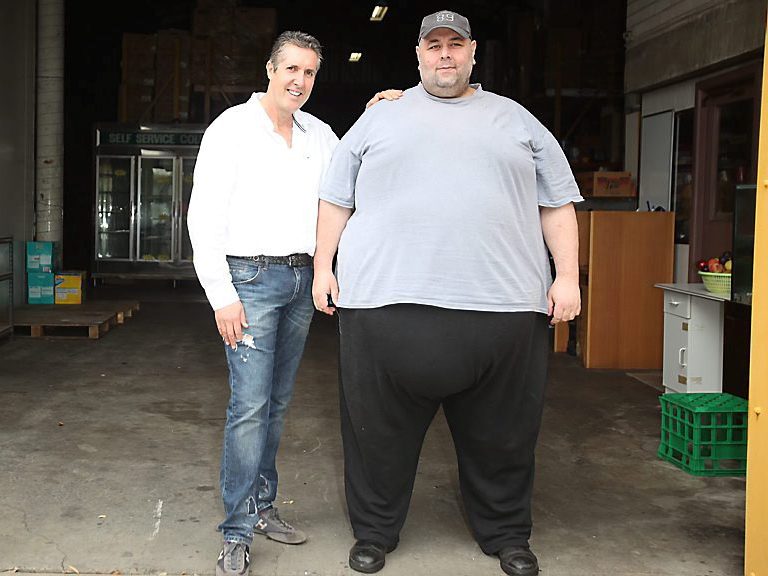 Mark Stephens with Jordan Tirekidis in 2012, before Jordan's weight loss