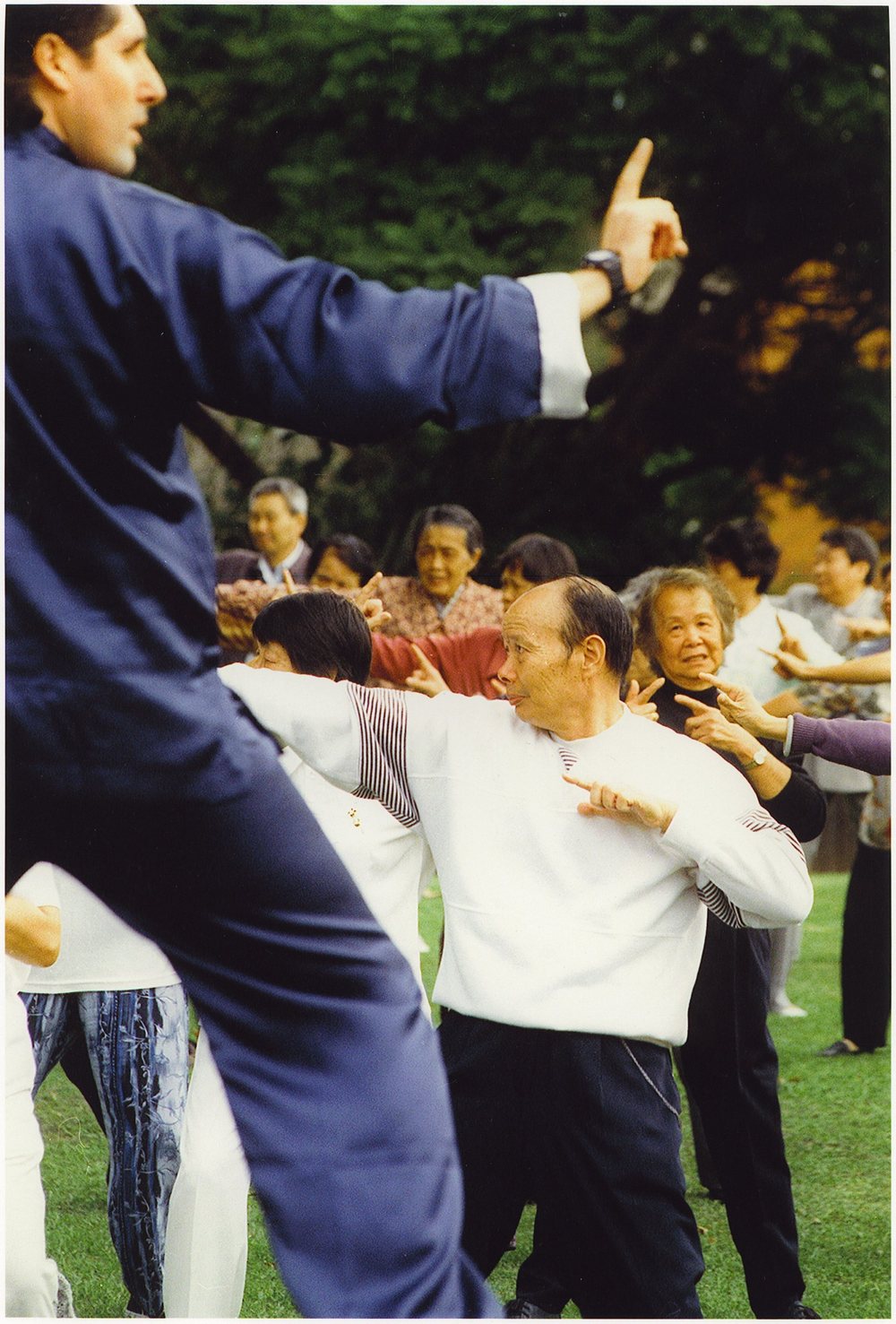 Mark Stephens leading a Tai Chi class in the park