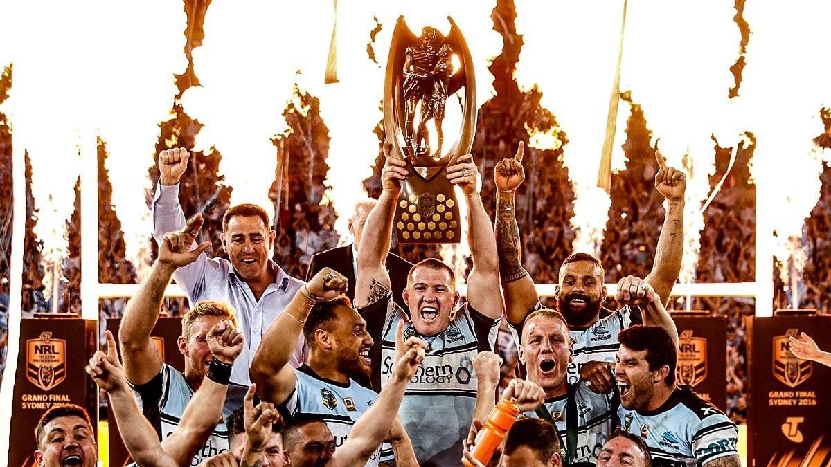 The Cronulla Sharks lifting the 2016 NRL premiership trophy